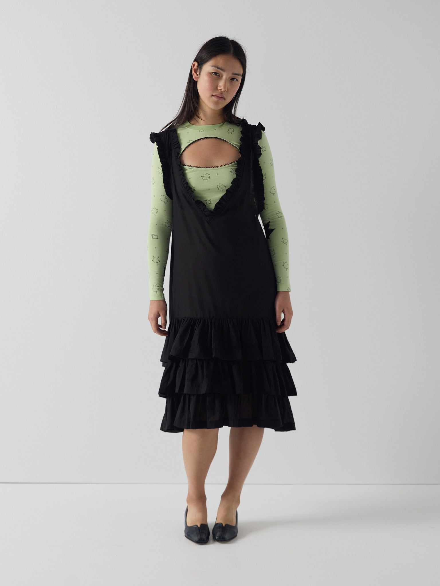 Apron frill drop waist dress in black