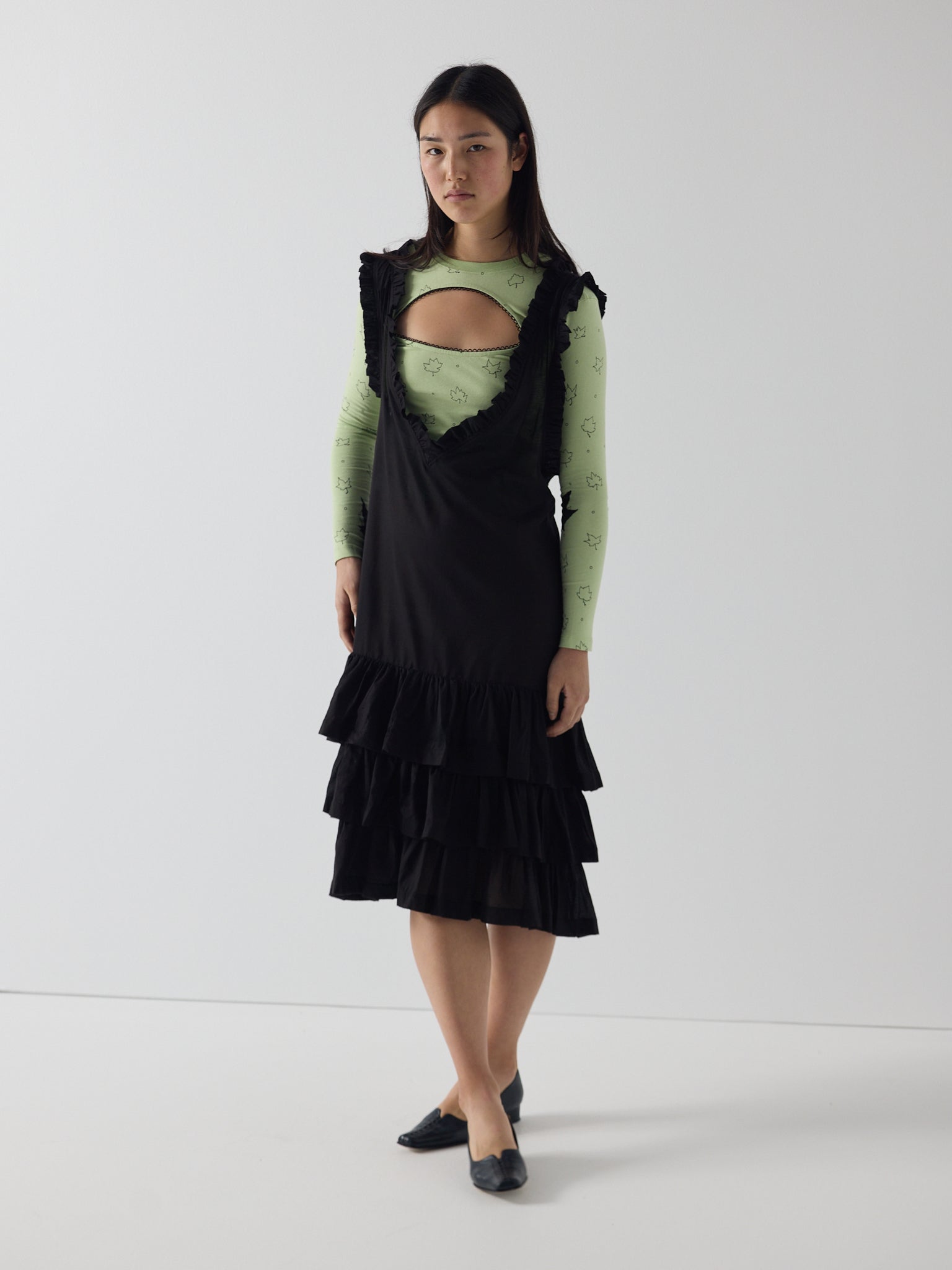 Apron frill drop waist dress in black