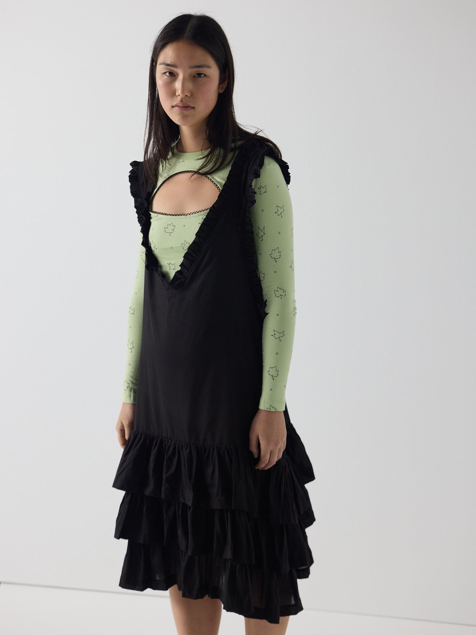 Apron frill drop waist dress in black