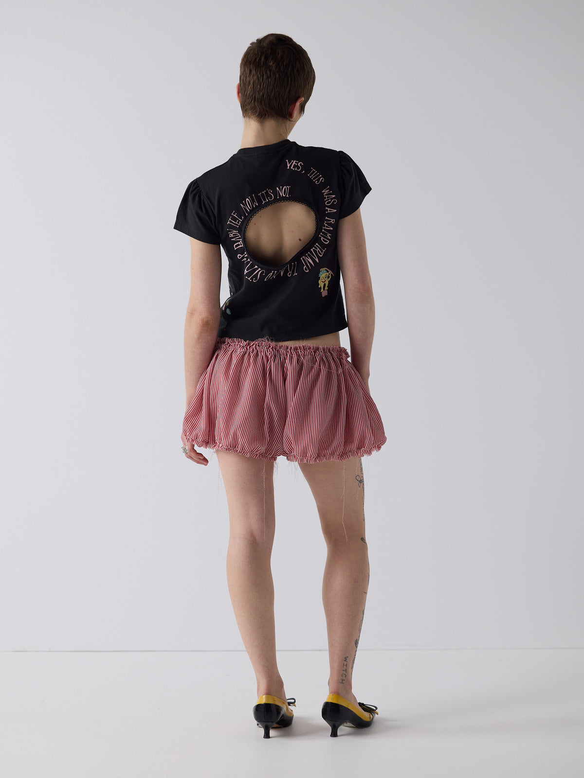 honor wears the logo removal baby tee in cutie charcoal, size xs