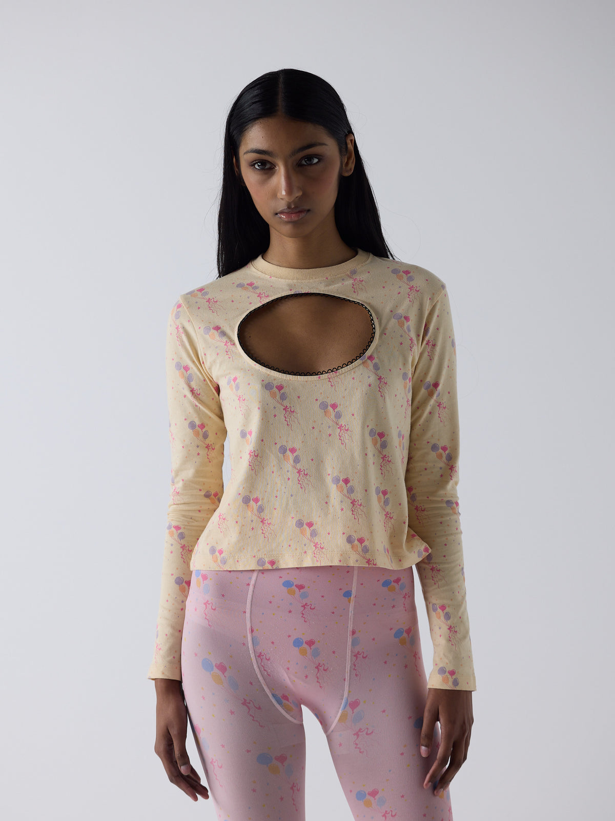 haasi wears the logo removal long sleeve in party, size s