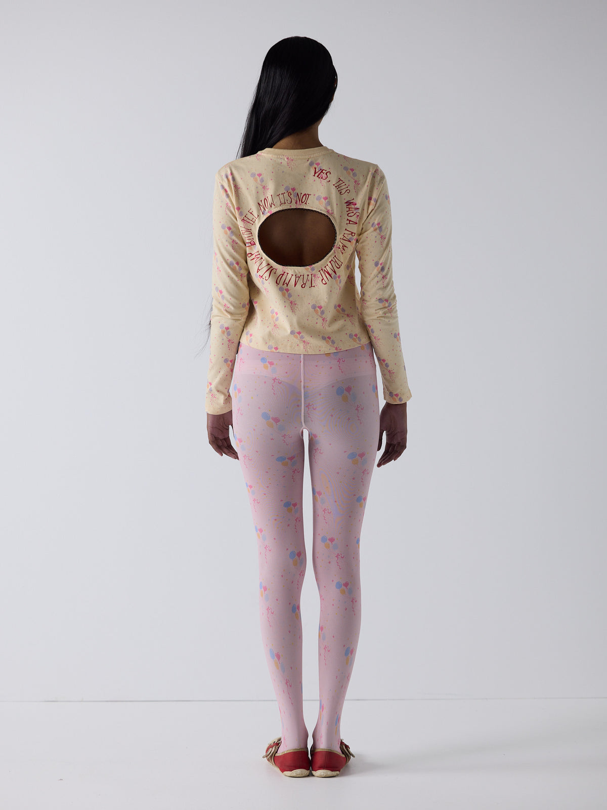 haasi wears the logo removal long sleeve in party, size s