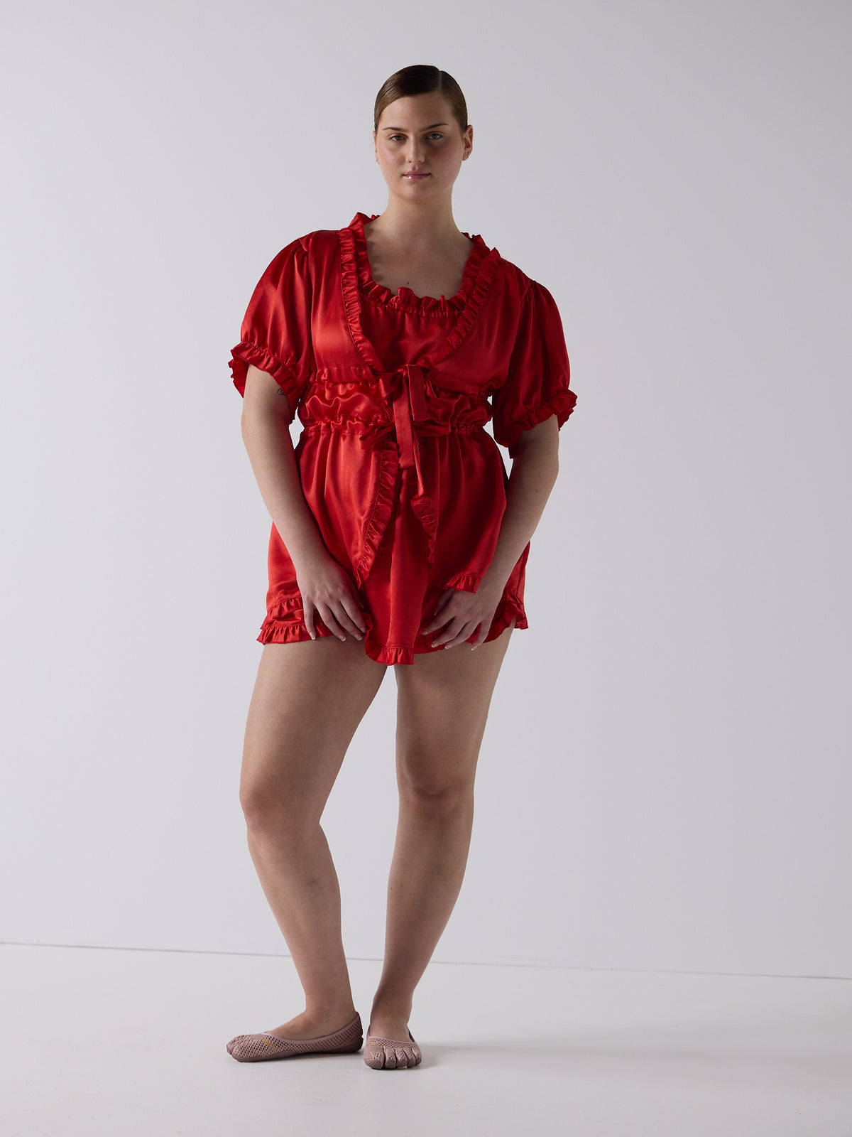 kim wears the babydoll dress in ribbon red, fit 1