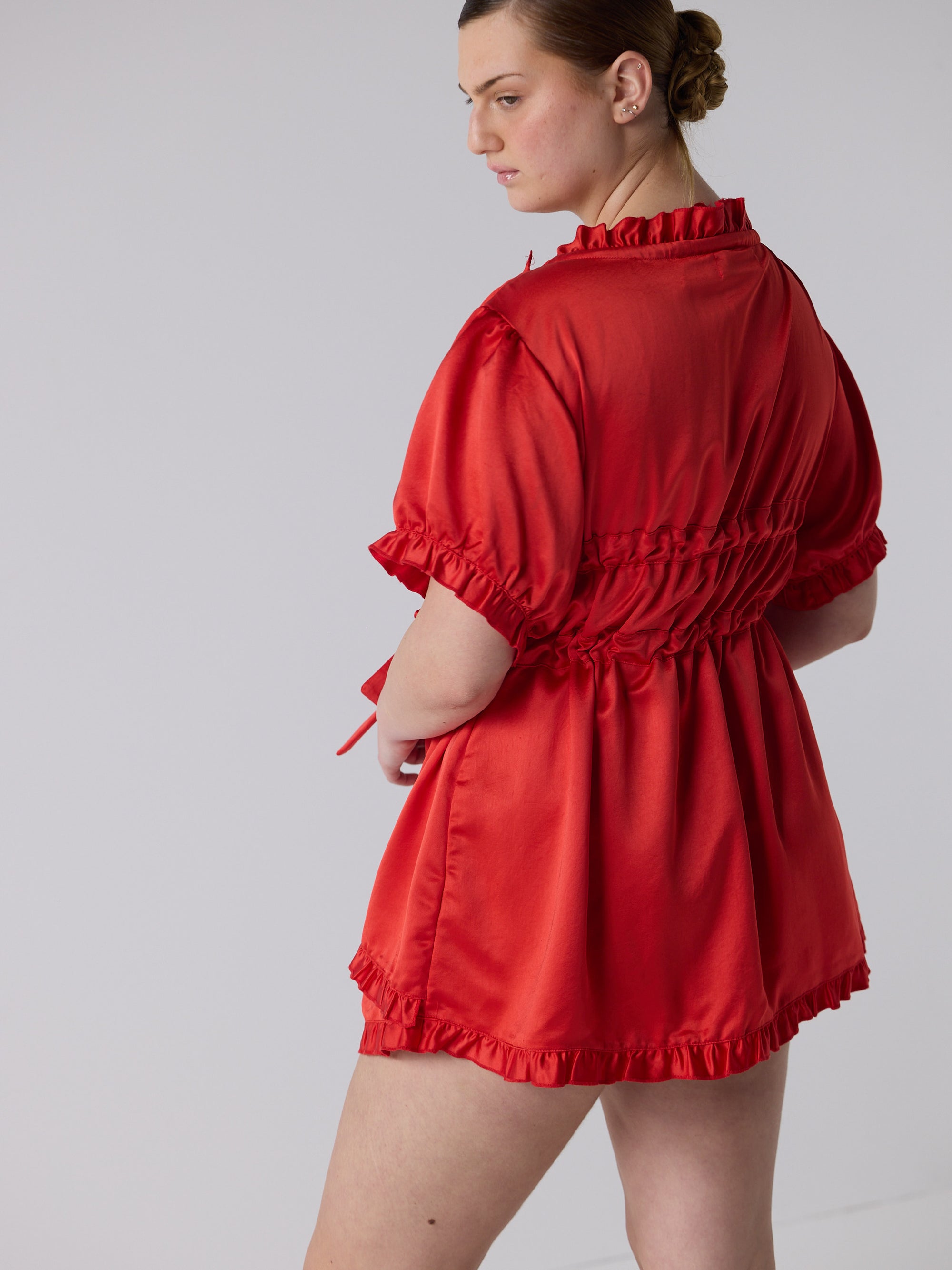 kim wears the babydoll dress in ribbon red, fit 1