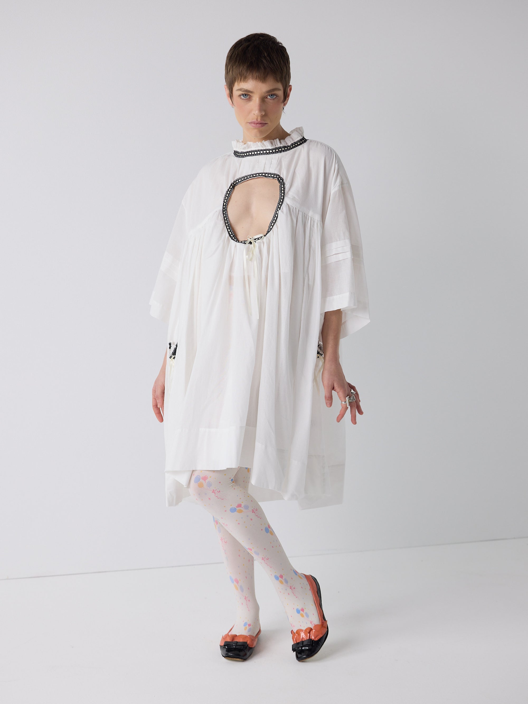 honor wears the holy smock dress in tooth white
