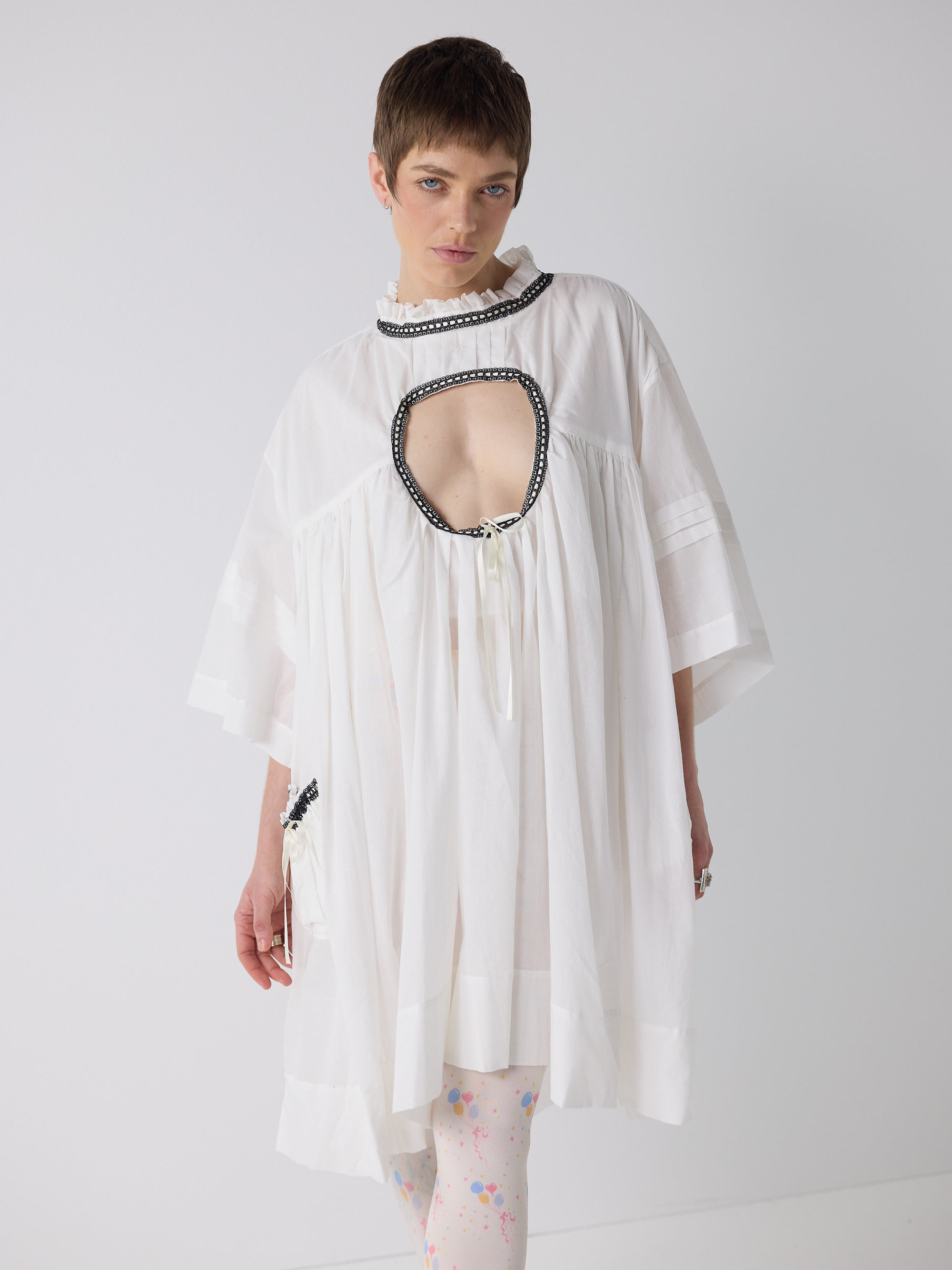honor wears the holy smock dress in tooth white