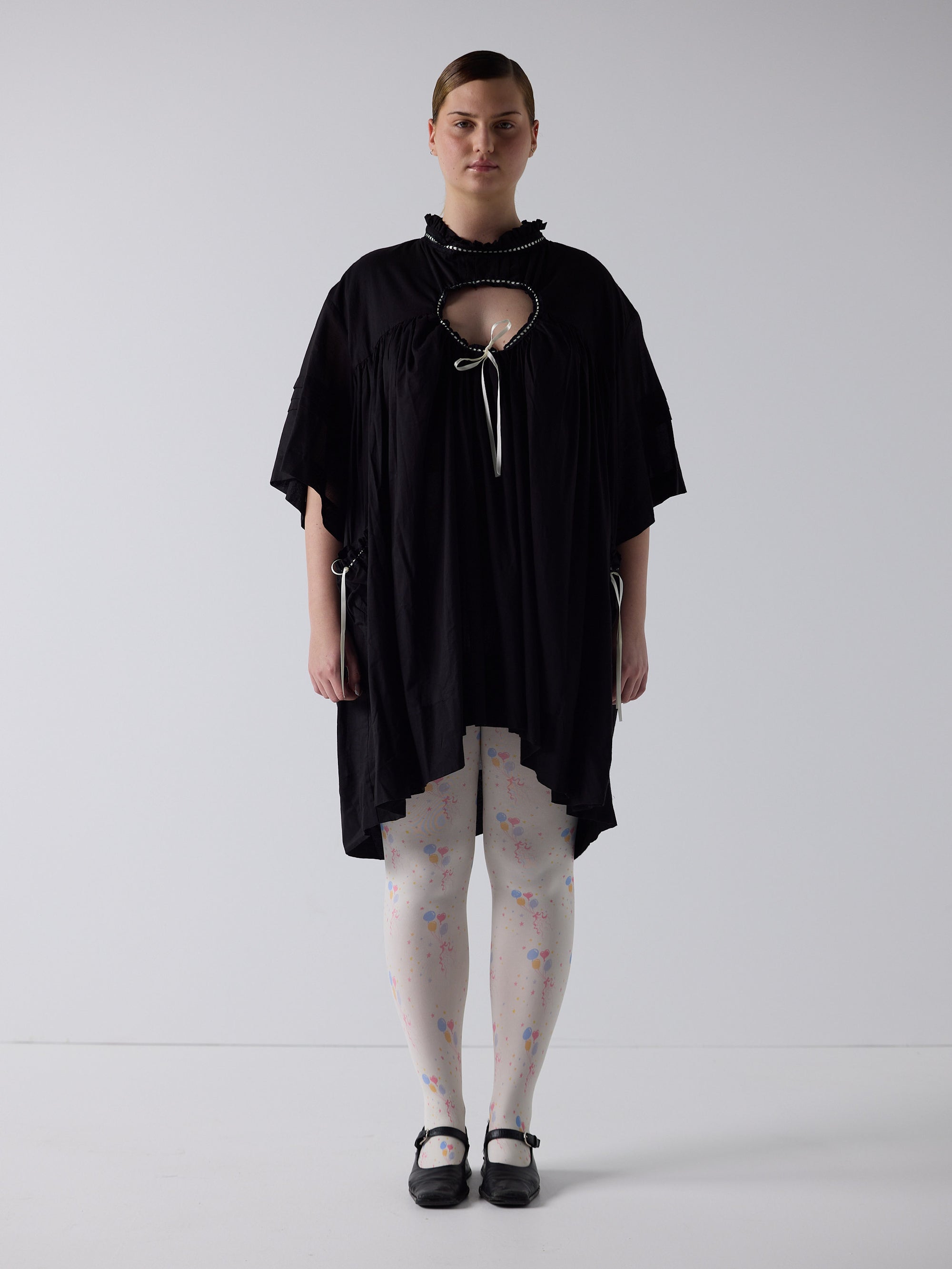 kim wears the holy smock dress in black