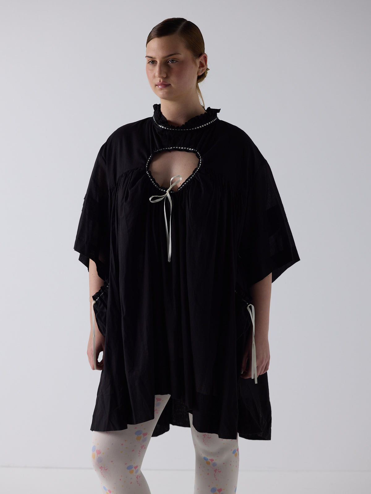 kim wears the holy smock dress in black