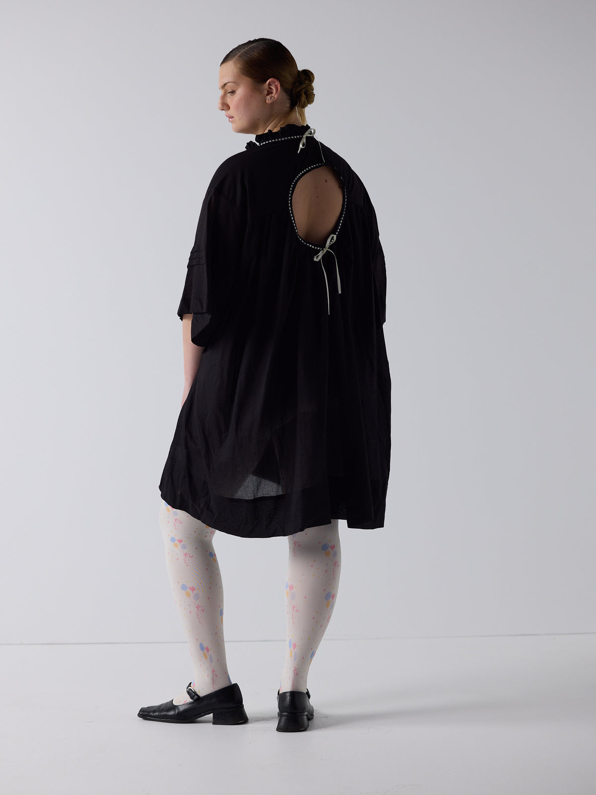 kim wears the holy smock dress in black