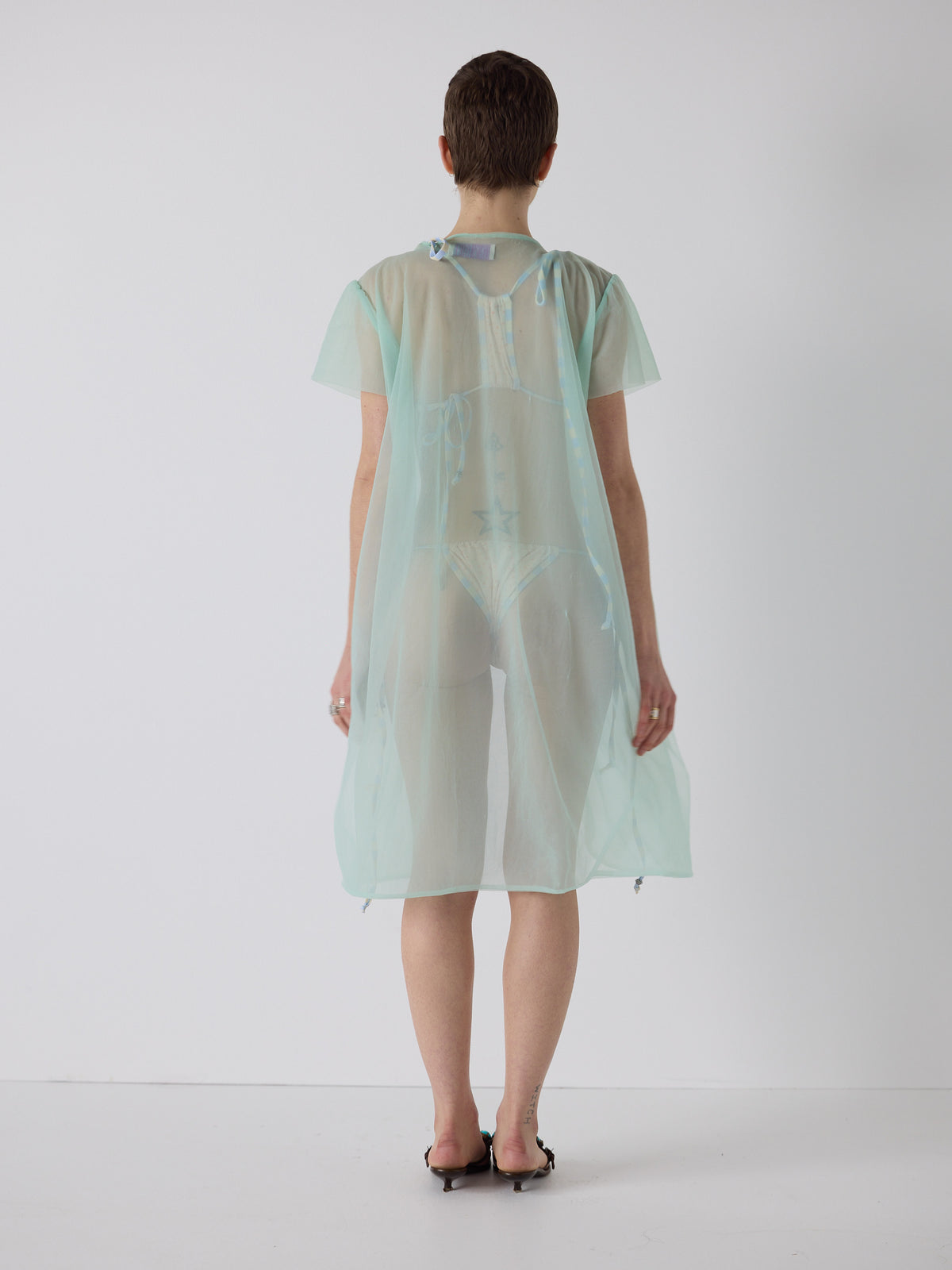 honor wears the peignoir in aqua