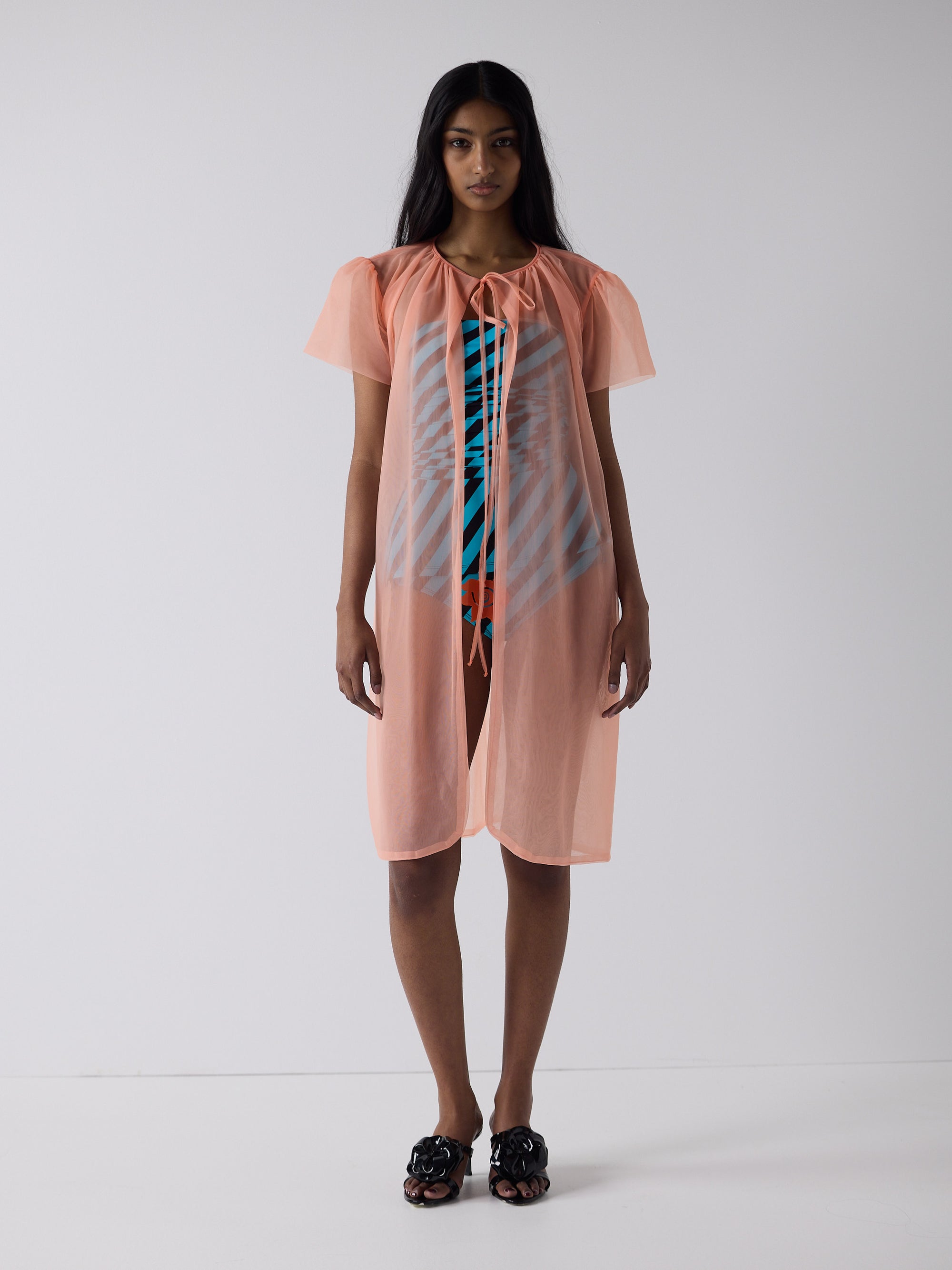 haasi wears the peignoir in soft flame
