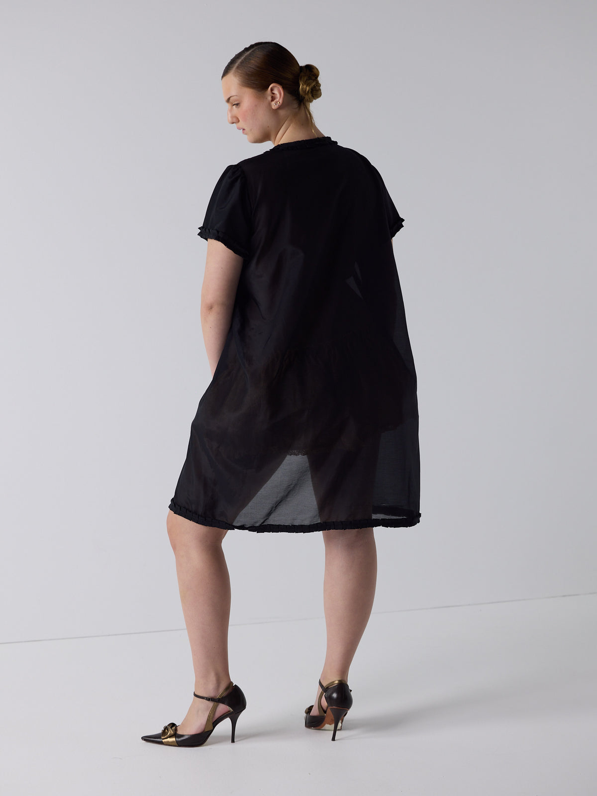 kim wears the frill peignoir cover up in black