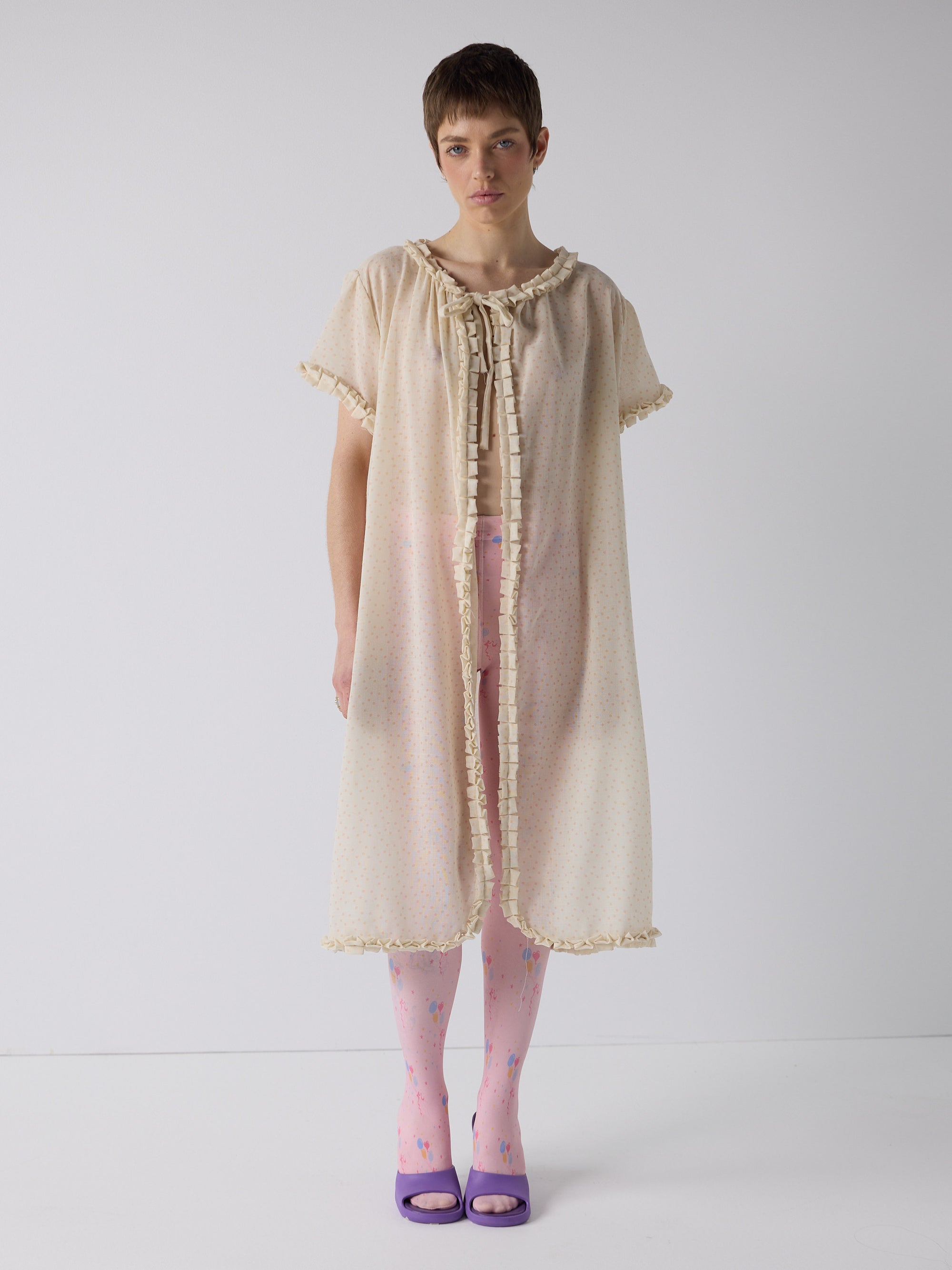 honor wears the frill peignoir cover up in micro dot wool
