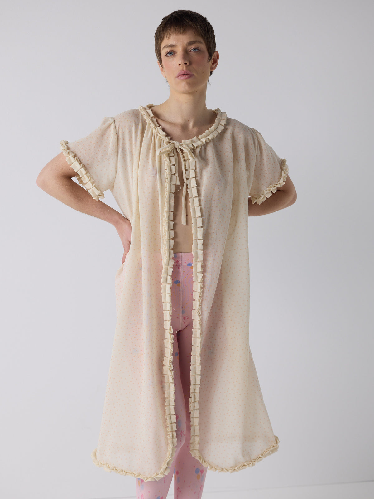 honor wears the frill peignoir cover up in micro dot wool
