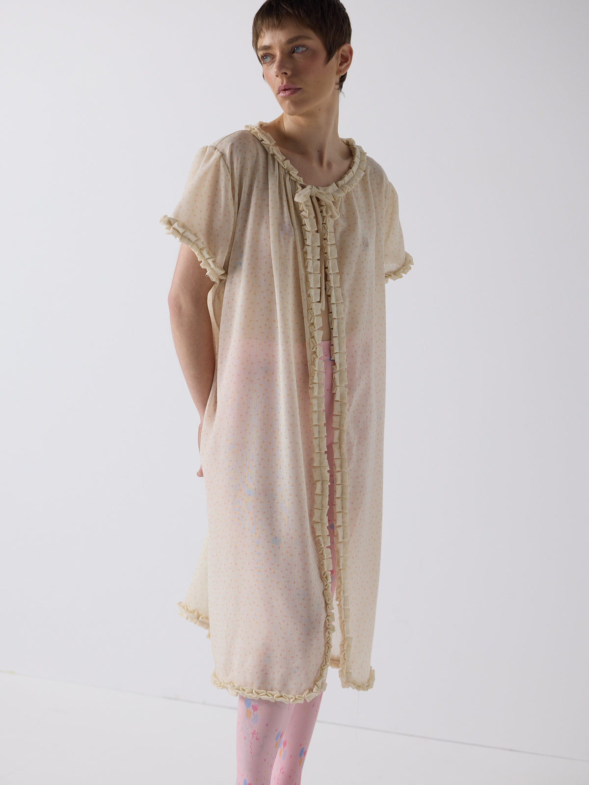 honor wears the frill peignoir cover up in micro dot wool
