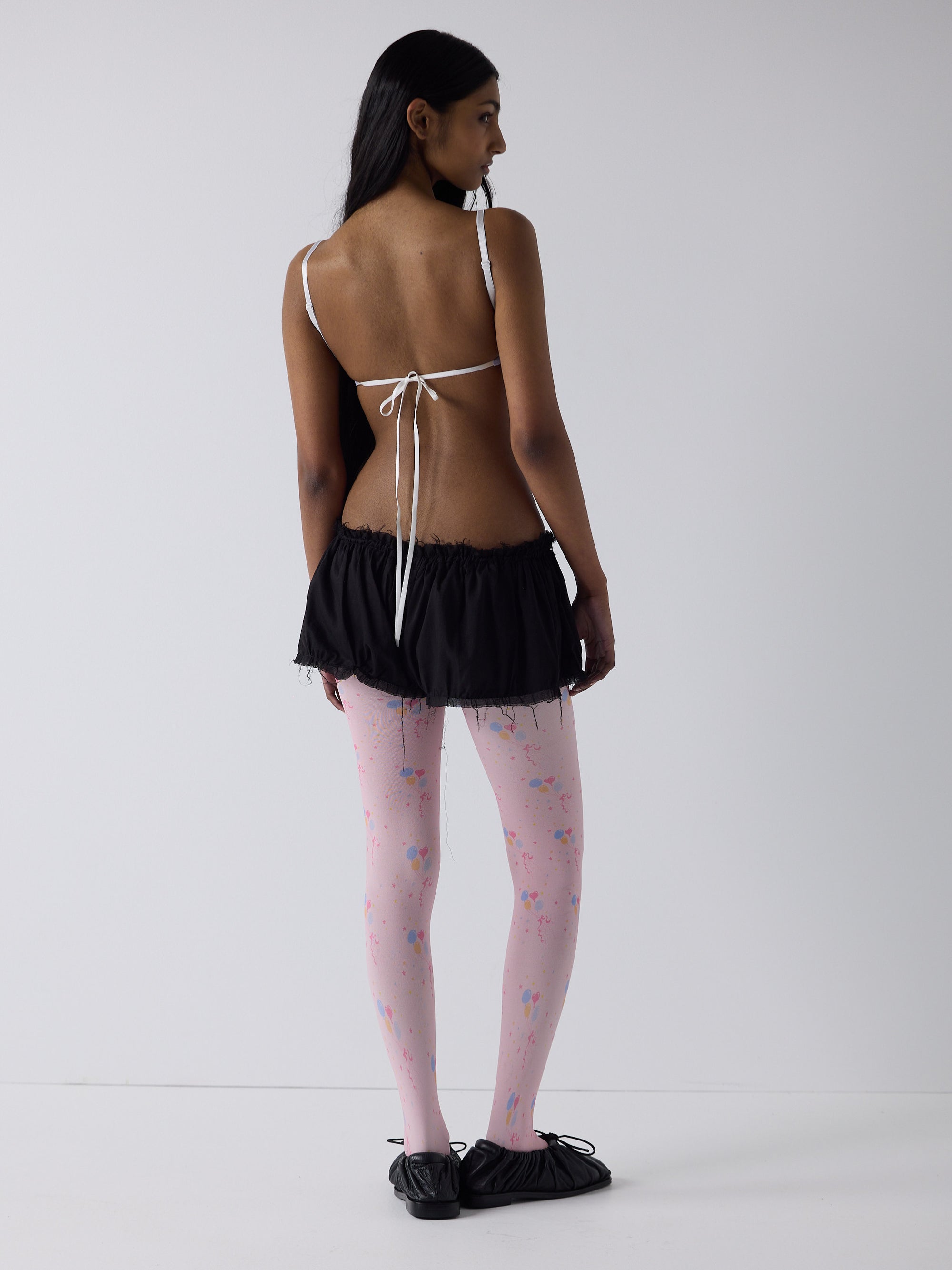 haasi wears the logo reusal bullet bra in lilac, fit 1