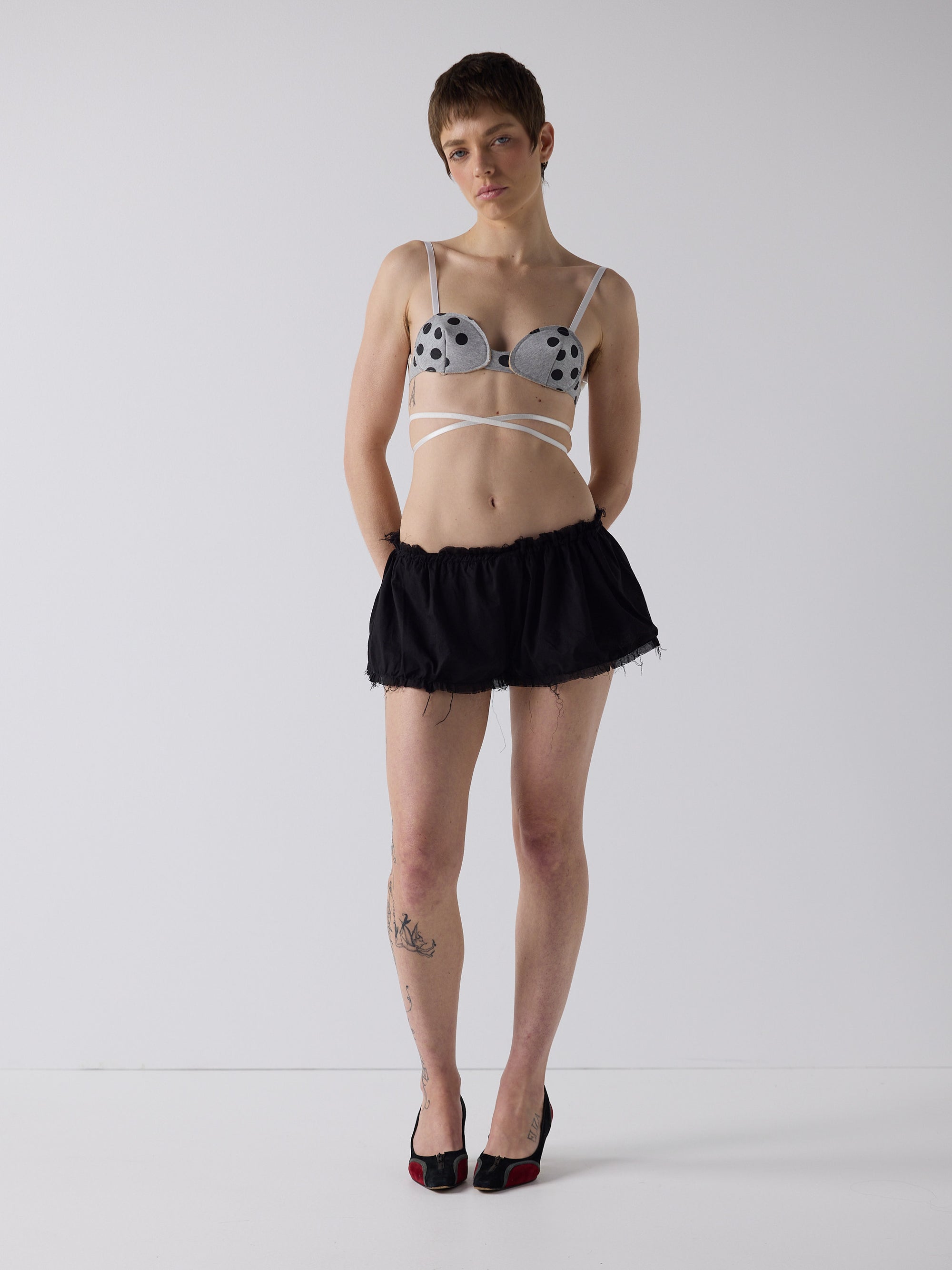 honor wears the niamh galea puff shorts in black cotton voile, fully lined with an internal adjustable drawcord waist