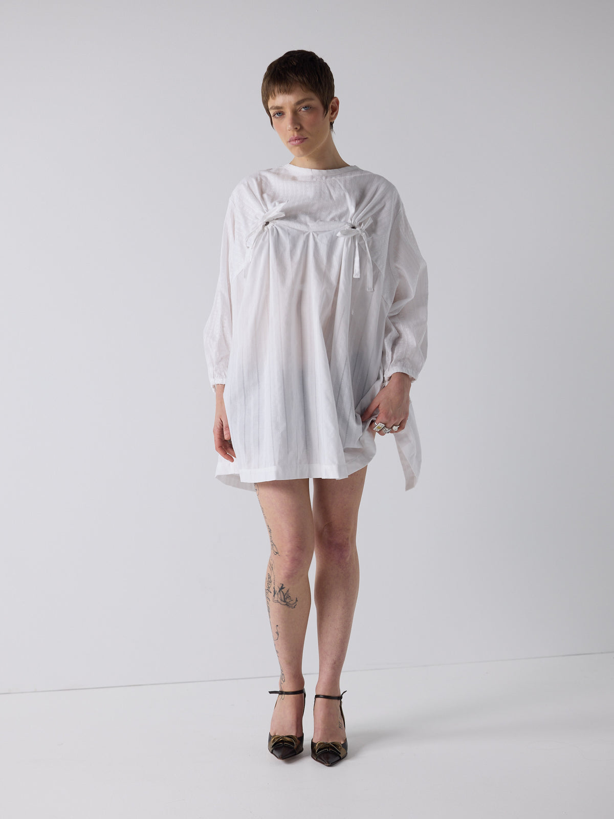 honor wears the nursing smock in white dobby