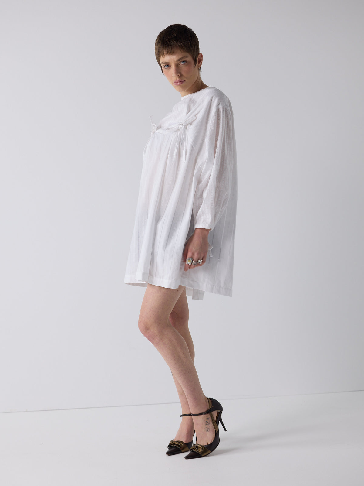 honor wears the nursing smock in white dobby