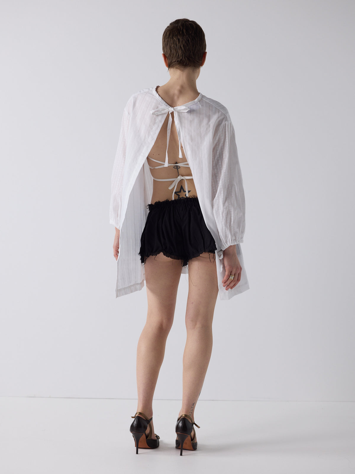 honor wears the nursing smock in white dobby