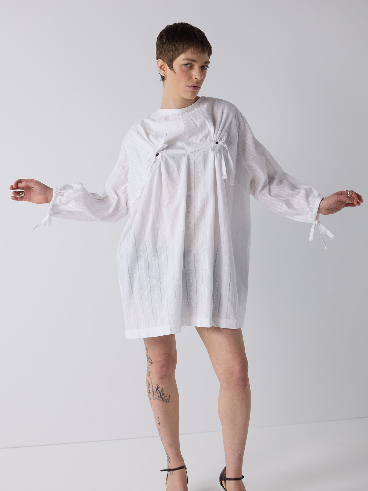 honor wears the nursing smock in white dobby