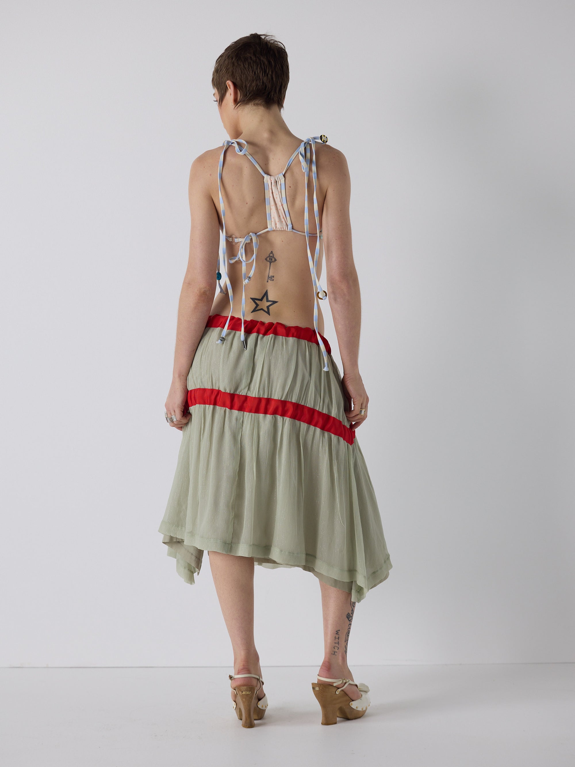 honor wears the drop waist tiered skirt in mint