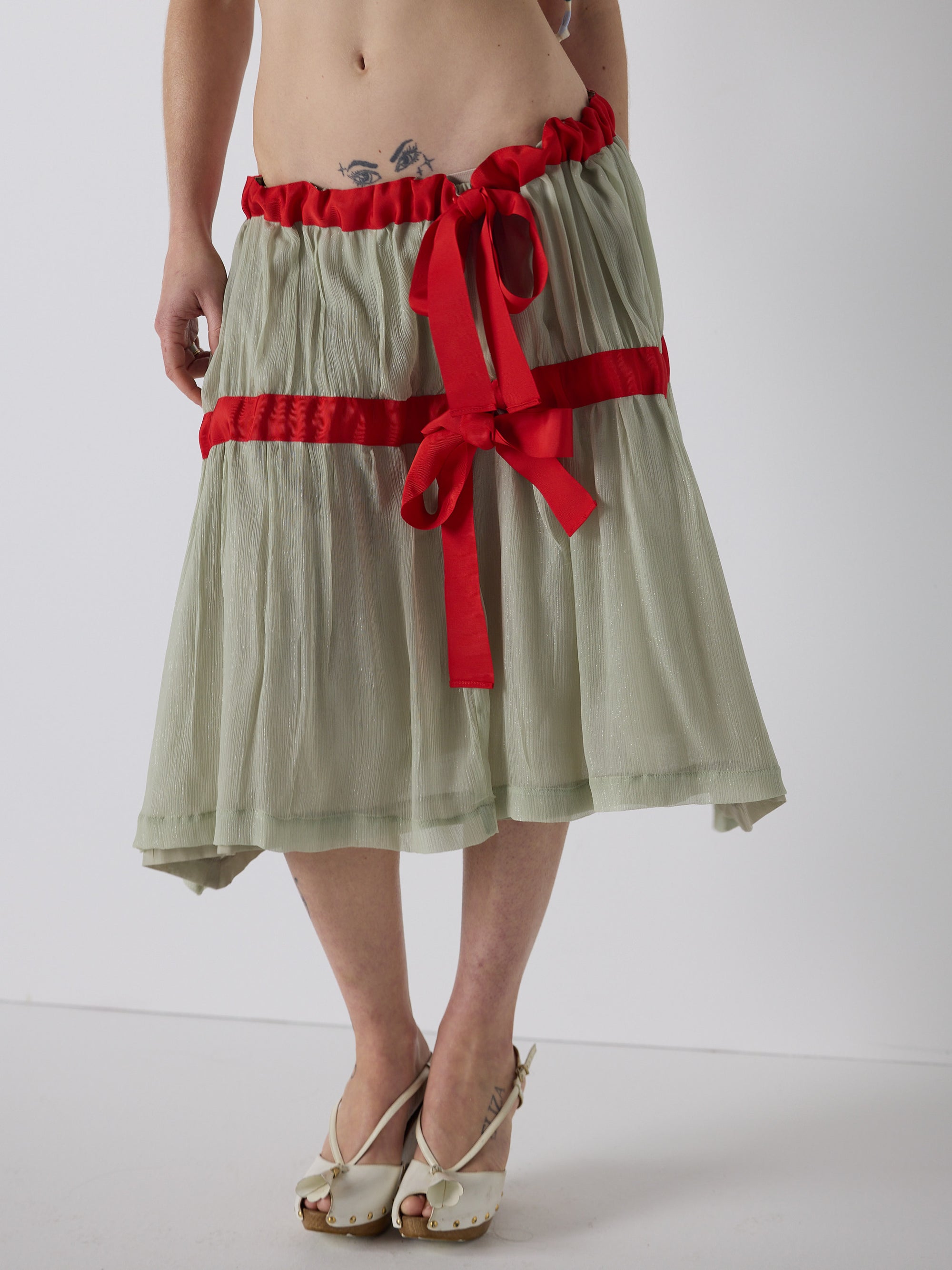 honor wears the drop waist tiered skirt in mint