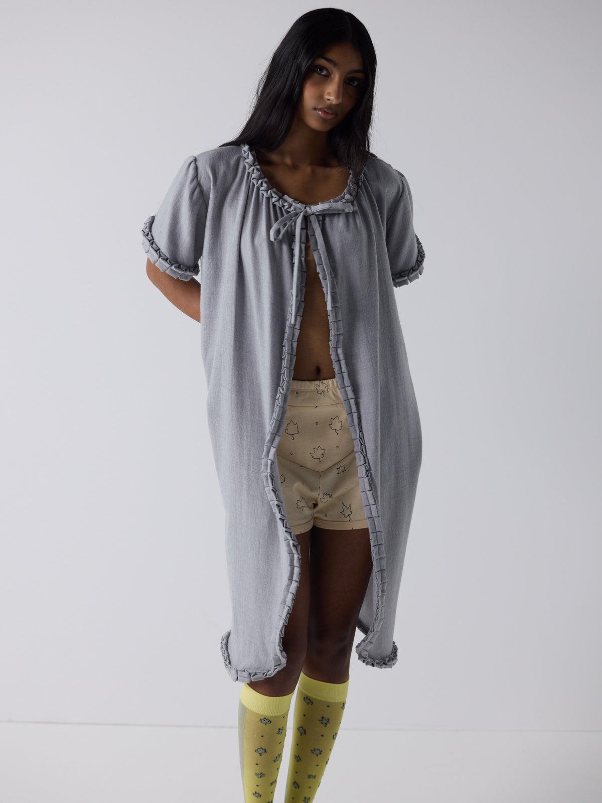 haasi wears the frill peignoir in grey