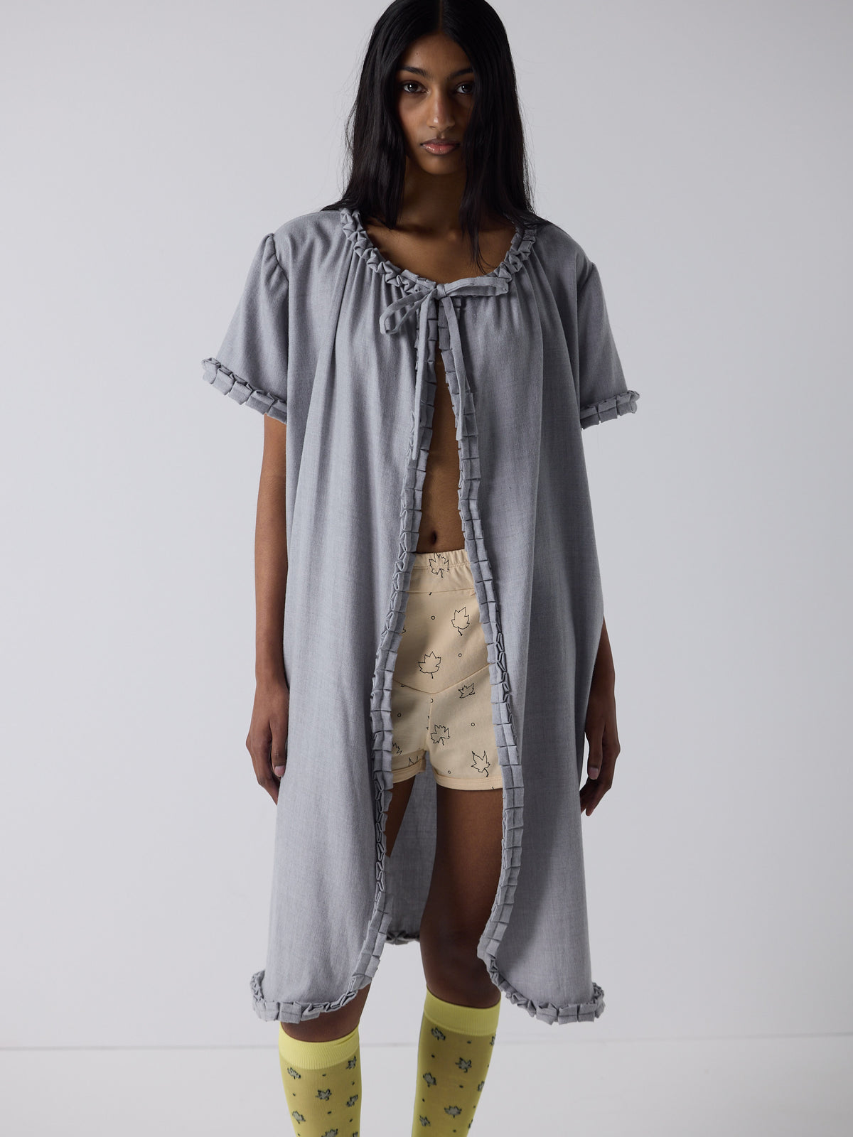 haasi wears the frill peignoir in grey