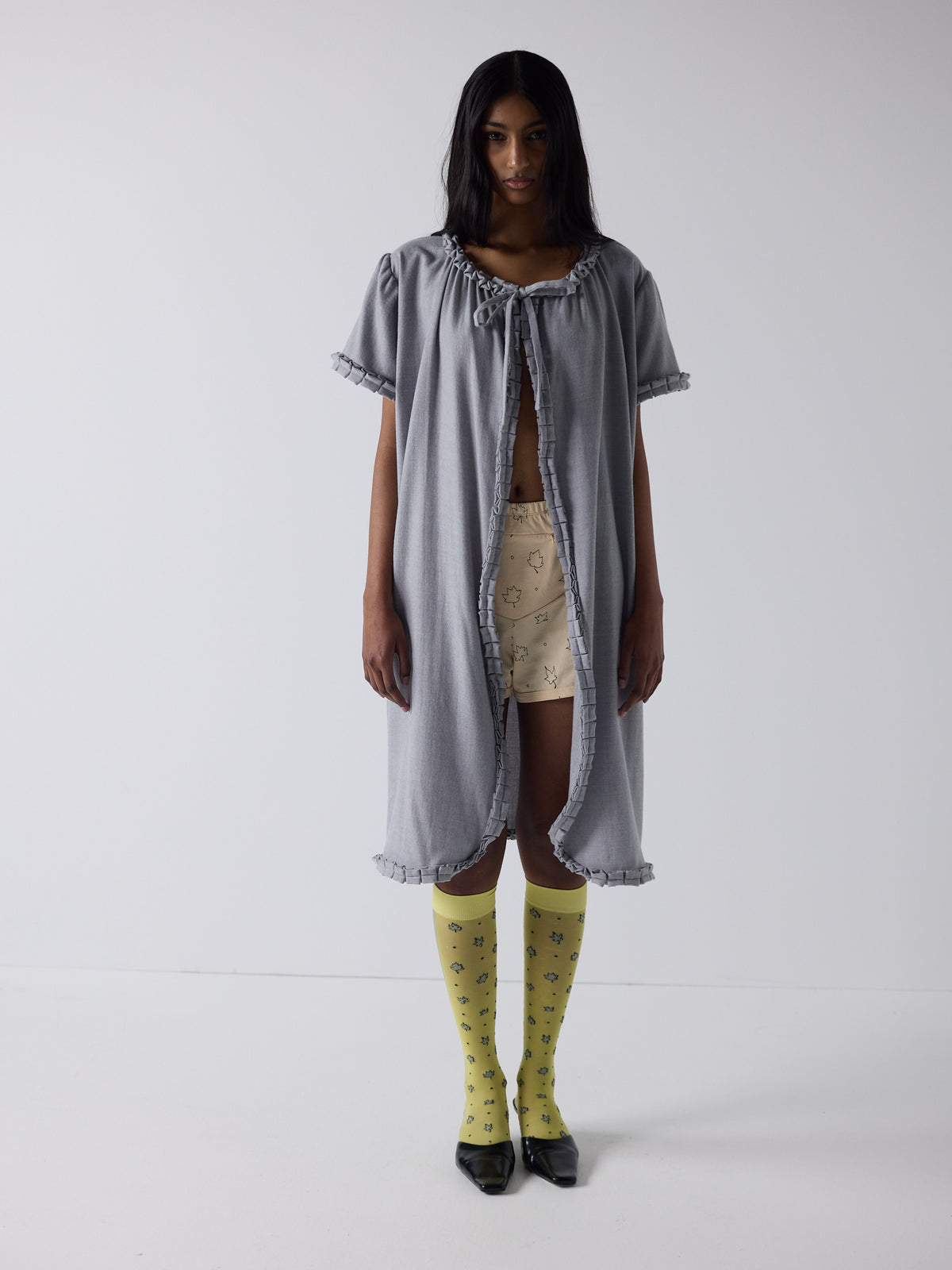 haasi wears the frill peignoir in grey