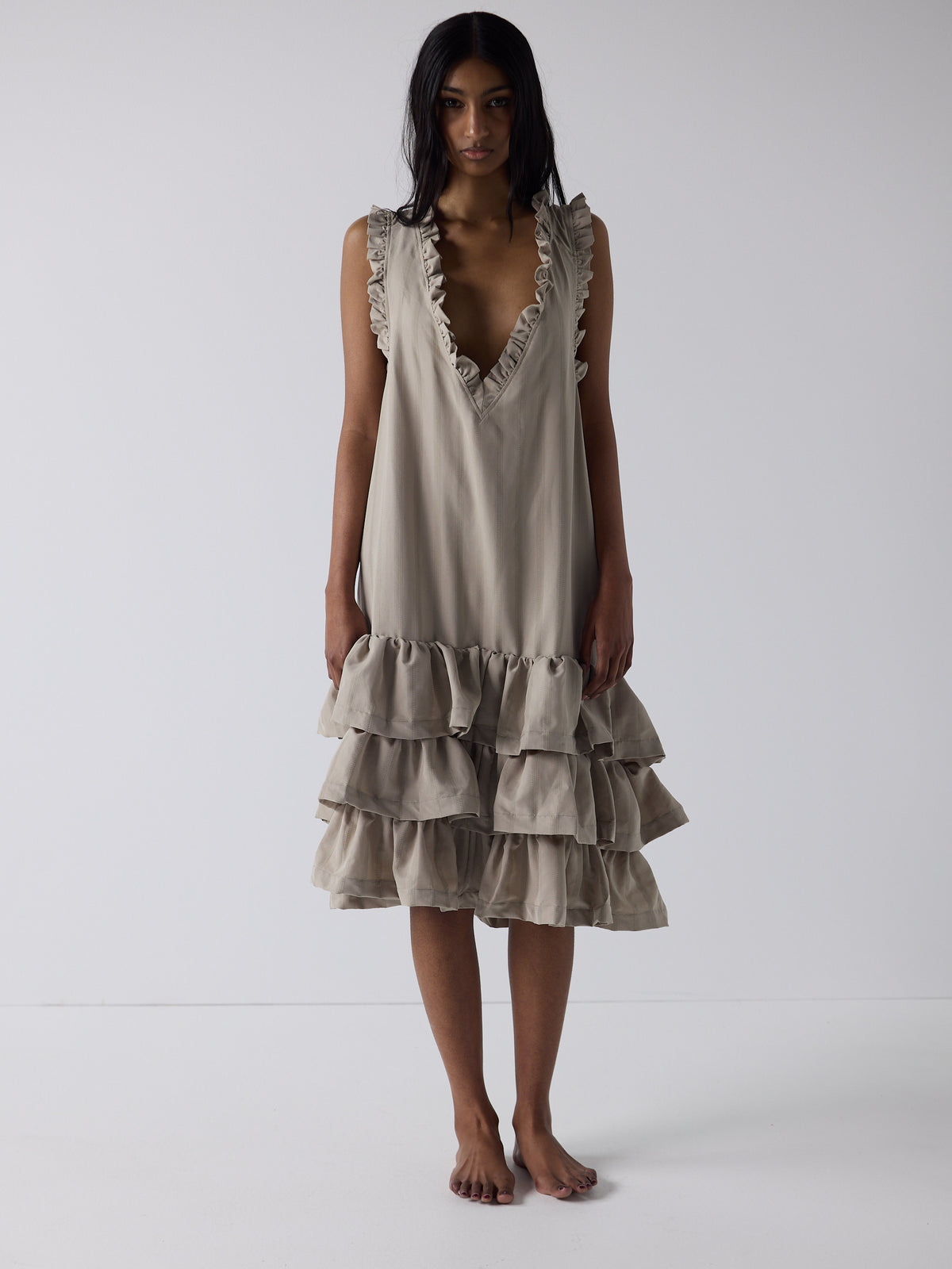 kim wears the frill peignoir in grey
