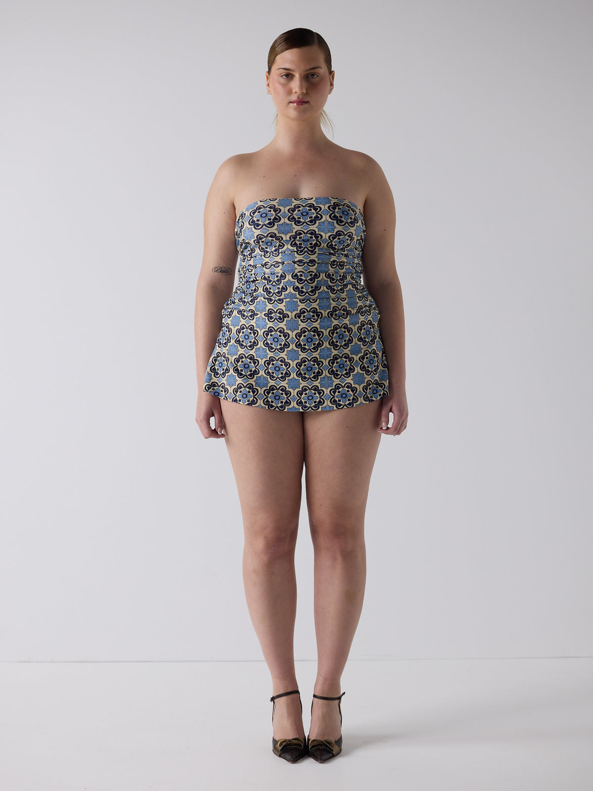 kim wears the twist one piece in buenos aires, size xl