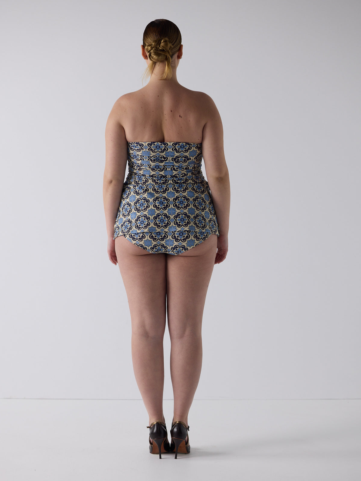 kim wears the twist one piece in buenos aires, size xl